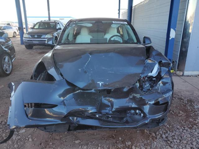 Photo 5 from auction – 2025 TESLA MODEL Y with VIN 7SAYGAEE6SF248060