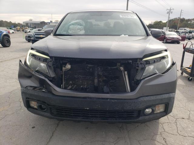 Photo 5 from auction – 2017 HONDA RIDGELINE with VIN 5FPYK2F66HB010394
