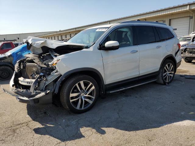 HONDA PILOT TOURING 2017 with VIN 5FNYF6H9XHB021104 - Photo from auction