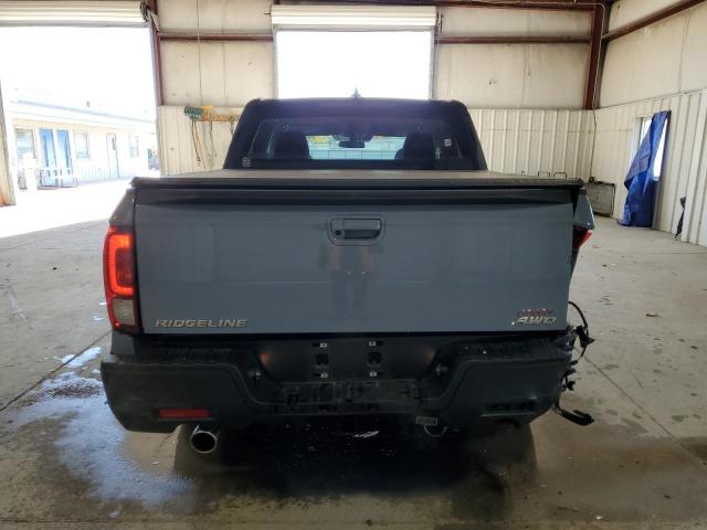Photo 6 from auction – 2023 HONDA RIDGELINE with VIN 5FPYK3F15PB046988