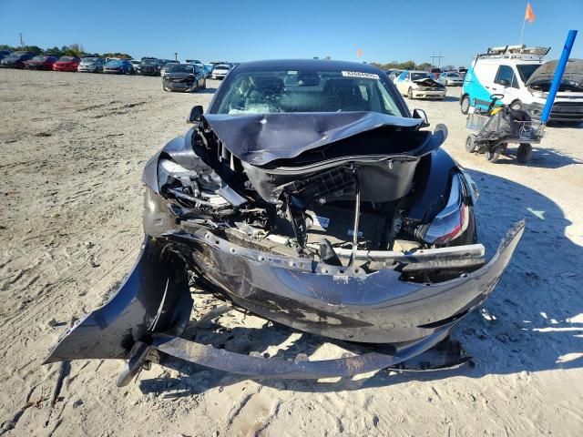 Photo 5 from auction – 2021 TESLA MODEL 3 with VIN 5YJ3E1EA5MF100009