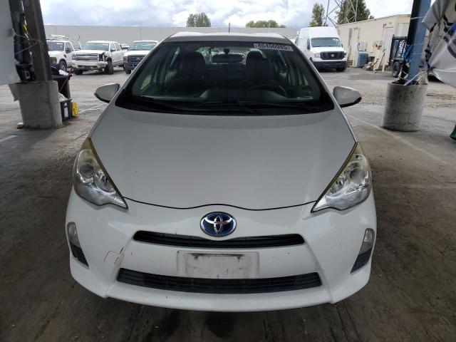 Photo 5 from auction – 2014 TOYOTA PRIUS C with VIN JTDKDTB3XE1063940