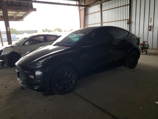 TESLA MODEL Y 2023 con VIN 7SAYGAEE1PF926673 - Foto de la subasta