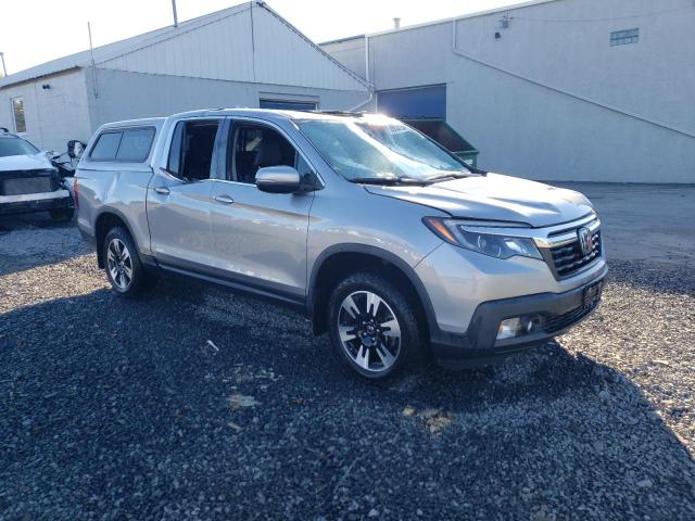 Photo 4 from auction – 2020 HONDA RIDGELINE with VIN 5FPYK3F5XLB025423