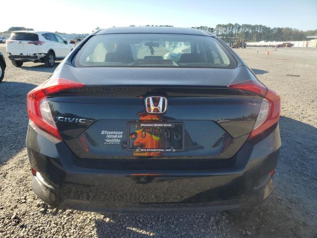 Photo 6 from auction – 2018 HONDA CIVIC LX with VIN 19XFC2F57JE024174
