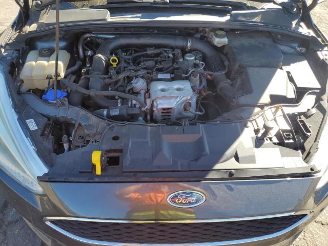 Photo 11 from auction – 2017 FORD FOCUS SE with VIN 1FADP3FE3HL310306