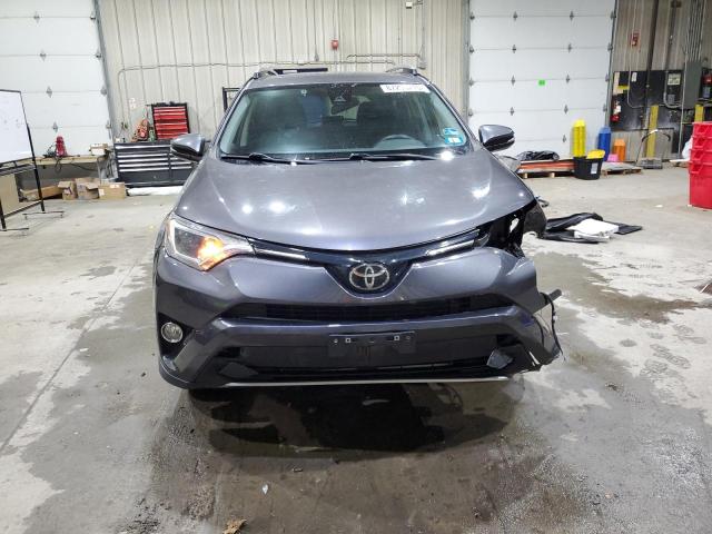 Photo 5 from auction – 2017 TOYOTA RAV4 XLE with VIN JTMRFREV7HJ170148