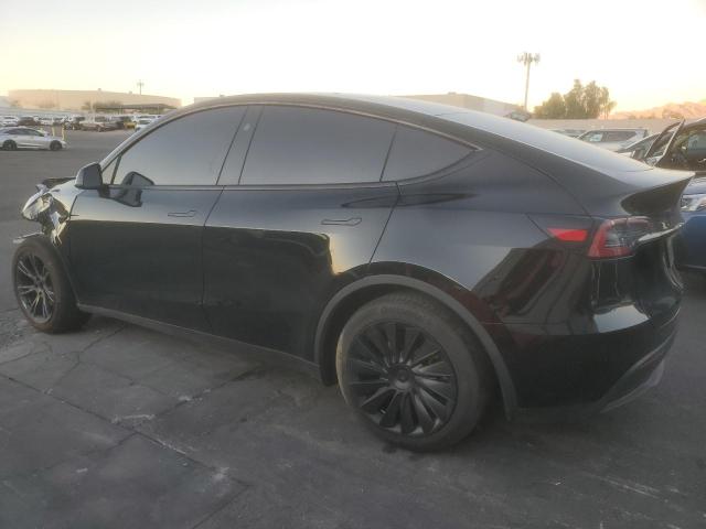 Photo 2 from auction – 2025 TESLA MODEL Y with VIN 7SAYGDED9SF251091
