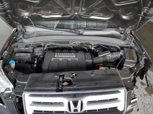 Photo 12 from auction – 2006 HONDA PILOT EX with VIN 2HKYF18736H546022