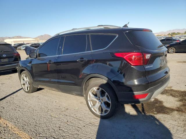 Photo 2 from auction – 2019 FORD ESCAPE TIT with VIN 1FMCU0J97KUA06058