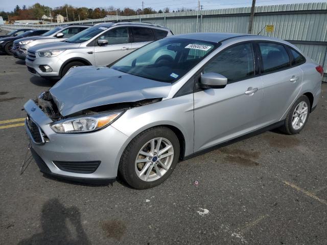 FORD FOCUS SE 2018 with VIN 1FADP3F24JL279739 - Photo from auction