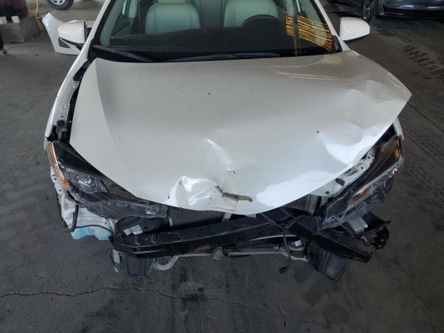 Photo 11 from auction – 2018 TOYOTA COROLLA L with VIN 5YFBURHE1JP846131