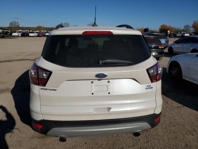 Photo 6 from auction – 2018 FORD ESCAPE SE with VIN 1FMCU9GD2JUC95736