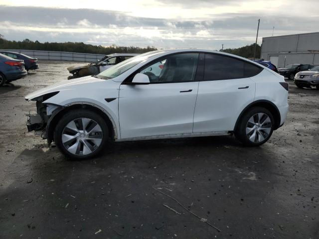 TESLA MODEL Y 2022 with VIN 7SAYGDEE8NF380520 - Photo from auction