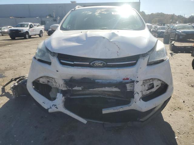 Foto 5 de la subasta – 2016 FORD ESCAPE TIT con VIN 1FMCU9J98GUA05013