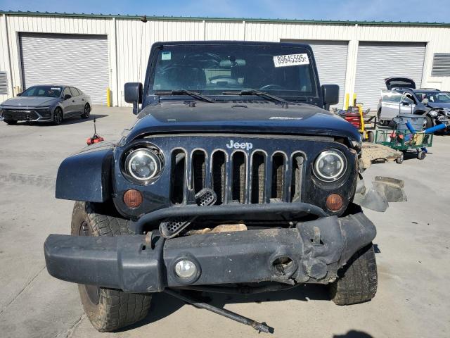 Photo 5 from auction – 2011 JEEP WRANGLER U with VIN 1J4HA5H12BL532596