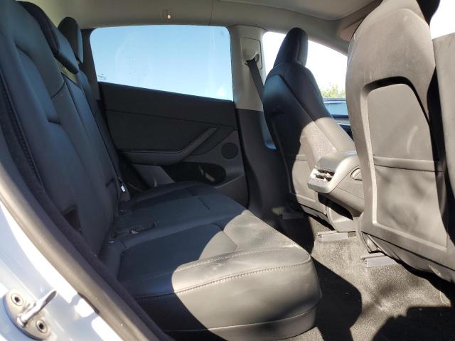 Photo 11 from auction – 2023 TESLA MODEL Y with VIN 7SAYGDEE6PA062850