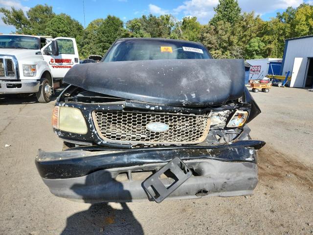 Photo 5 from auction – 2003 FORD F150 with VIN 1FTRX17WX3NA11629