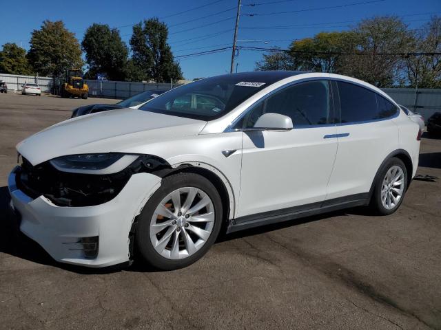 TESLA MODEL X 2017 with VIN 5YJXCBE24HF076684 - Photo from auction