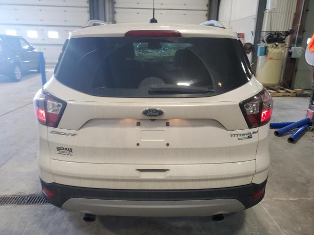 Photo 6 from auction – 2017 FORD ESCAPE TITANIUM with VIN 1FMCU9JD5HUA61349
