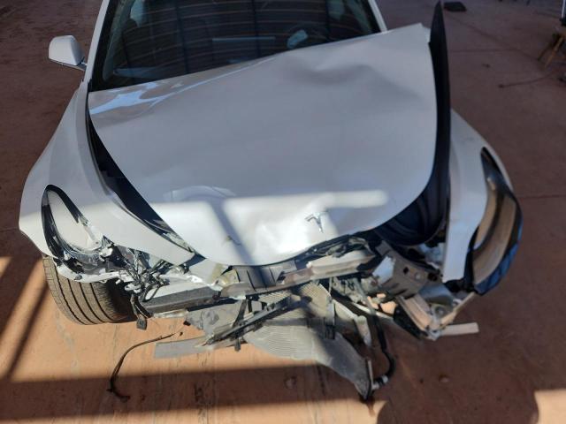 Photo 11 from auction – 2019 TESLA MODEL 3 with VIN 5YJ3E1EA7KF484100