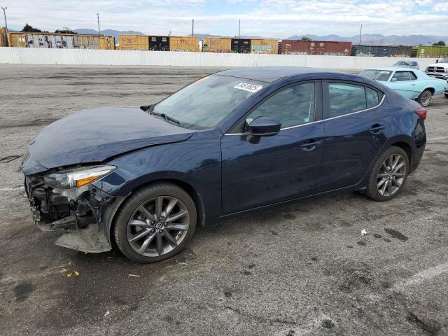 MAZDA 3 TOURING 2018 with VIN 3MZBN1V34JM178542 - Photo from auction