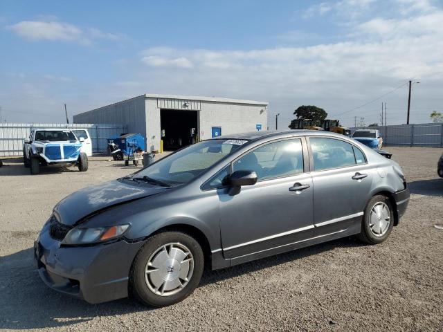 HONDA CIVIC HYBRID 2011 with VIN JHMFA3F24BS000459 - Photo from auction