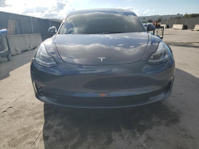 Photo 5 from auction – 2022 TESLA MODEL 3 with VIN 5YJ3E1EB9NF247217