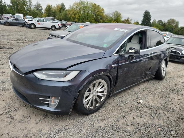 TESLA MODEL X 2018 with VIN 5YJXCBE23JF087732 - Photo from auction