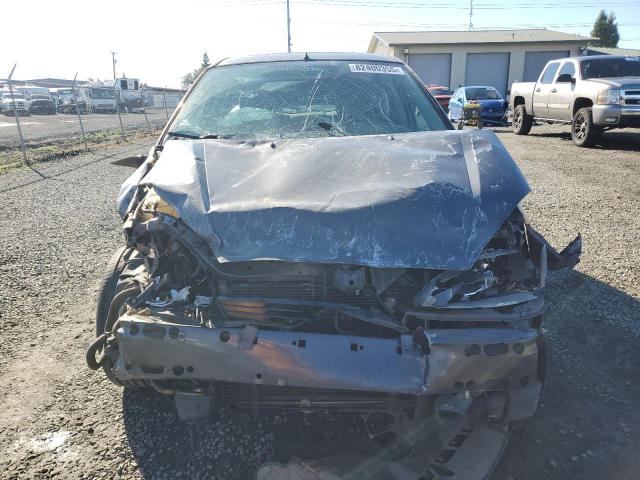 Photo 5 from auction – 2004 FORD FOCUS ZX5 with VIN 3FAFP37ZX4R124896