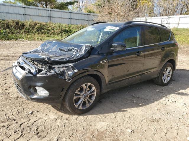 FORD ESCAPE SE 2018 with VIN 1FMCU9GD2JUD49780 - Photo from auction
