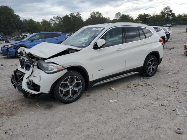 BMW X1 XDRIVE2 2018 with VIN WBXHT3C36J5F88871 - Photo from auction