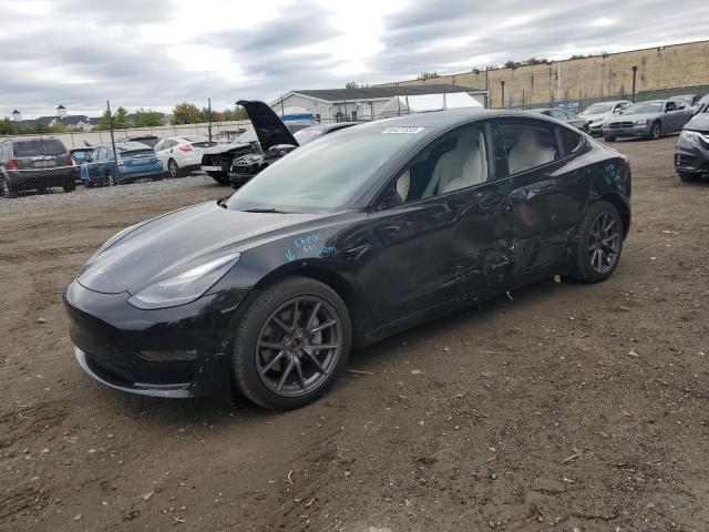 TESLA MODEL 3 2022 with VIN 5YJ3E1EB3NF101363 - Photo from auction