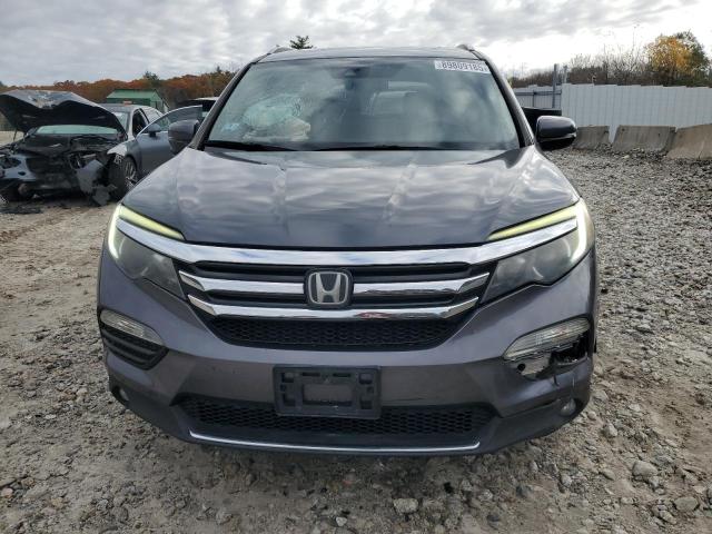 Photo 5 from auction – 2016 HONDA PILOT TOUR with VIN 5FNYF6H94GB024093