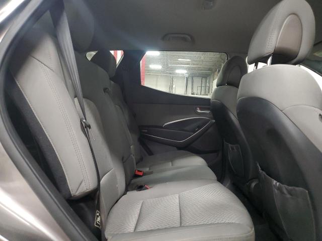 Photo 11 from auction – 2014 HYUNDAI SANTA FE S with VIN 5XYZTDLB2EG160076