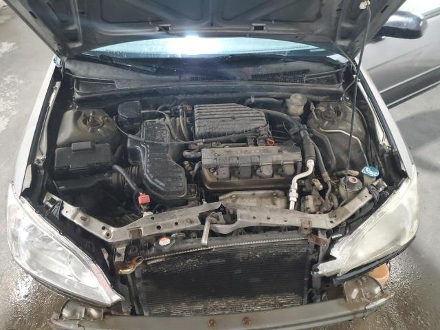 Photo 11 from auction – 2004 HONDA CIVIC LX with VIN 2HGES16514H596165