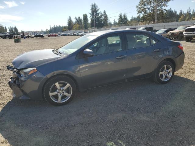 TOYOTA COROLLA L 2014 with VIN 5YFBURHE2EP099385 - Photo from auction