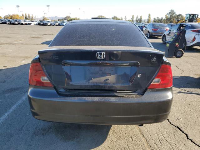 Photo 6 from auction – 2002 HONDA CIVIC LX with VIN 1HGEM21542L019038