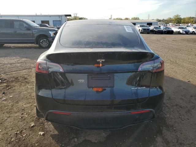 Photo 6 from auction – 2021 TESLA MODEL Y with VIN 5YJYGAEE9MF293770