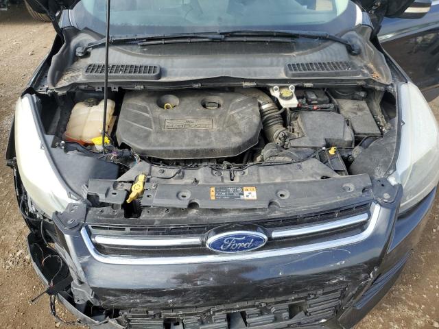 Photo 11 from auction – 2014 FORD ESCAPE TITANIUM with VIN 1FMCU9J99EUB60649