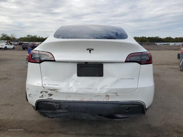 Photo 6 from auction – 2024 TESLA MODEL Y with VIN 7SAYGDEE0RA259497
