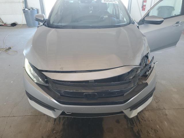 Photo 11 from auction – 2017 HONDA CIVIC EX with VIN 2HGFC2F85HH556520