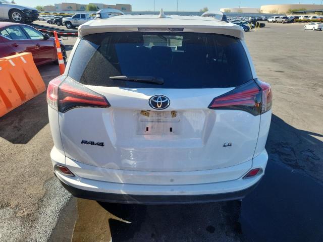 Photo 6 from auction – 2018 TOYOTA RAV4 LE with VIN 2T3ZFREV5JW462632