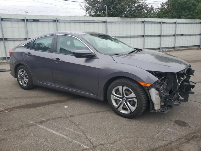 Photo 4 from auction – 2018 HONDA CIVIC LX with VIN 19XFC2F51JE016944