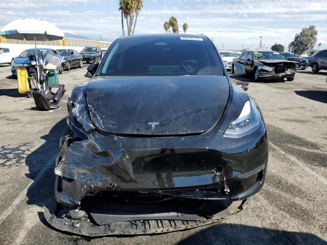 Photo 5 from auction – 2023 TESLA MODEL Y with VIN 7SAYGDEE0PA176391