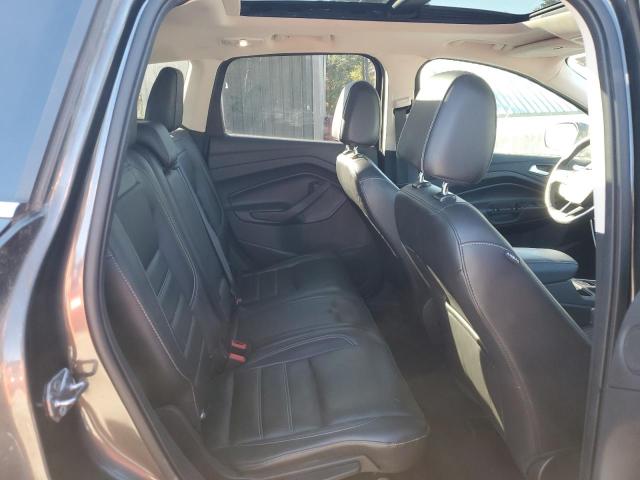 Photo 11 from auction – 2017 FORD ESCAPE TIT with VIN 1FMCU9J98HUC40710