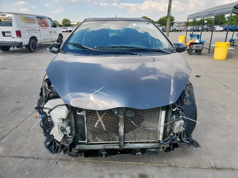 Photo 5 from auction – 2013 TOYOTA PRIUS C with VIN JTDKDTB3XD1555950