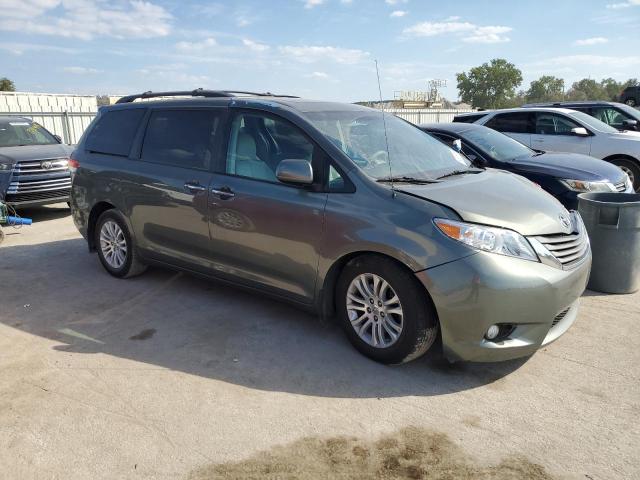 Photo 4 from auction – 2014 TOYOTA SIENNA XLE with VIN 5TDYK3DC8ES484457