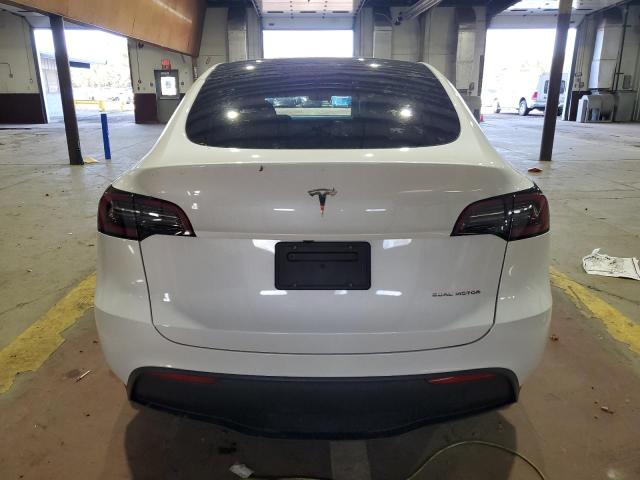 Photo 6 from auction – 2023 TESLA MODEL Y with VIN 7SAYGAEE3PF966057