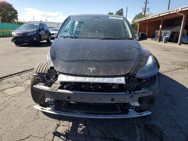 Photo 5 from auction – 2023 TESLA MODEL Y with VIN 7SAYGDEE6PA200077